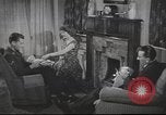 Image of U.S. Airman guest in British home United Kingdom, 1953, second 4 stock footage video 65675065566