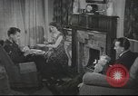 Image of U.S. Airman guest in British home United Kingdom, 1953, second 5 stock footage video 65675065566