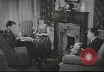 Image of U.S. Airman guest in British home United Kingdom, 1953, second 6 stock footage video 65675065566