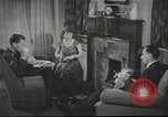 Image of U.S. Airman guest in British home United Kingdom, 1953, second 7 stock footage video 65675065566