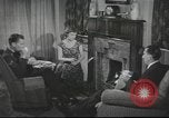 Image of U.S. Airman guest in British home United Kingdom, 1953, second 8 stock footage video 65675065566