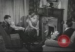 Image of U.S. Airman guest in British home United Kingdom, 1953, second 9 stock footage video 65675065566
