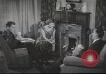 Image of U.S. Airman guest in British home United Kingdom, 1953, second 10 stock footage video 65675065566