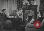 Image of U.S. Airman guest in British home United Kingdom, 1953, second 11 stock footage video 65675065566