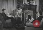 Image of U.S. Airman guest in British home United Kingdom, 1953, second 12 stock footage video 65675065566