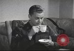 Image of U.S. Airman guest in British home United Kingdom, 1953, second 13 stock footage video 65675065566