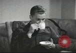 Image of U.S. Airman guest in British home United Kingdom, 1953, second 14 stock footage video 65675065566