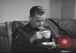 Image of U.S. Airman guest in British home United Kingdom, 1953, second 15 stock footage video 65675065566