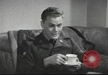 Image of U.S. Airman guest in British home United Kingdom, 1953, second 16 stock footage video 65675065566