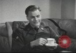 Image of U.S. Airman guest in British home United Kingdom, 1953, second 17 stock footage video 65675065566