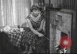 Image of U.S. Airman guest in British home United Kingdom, 1953, second 24 stock footage video 65675065566