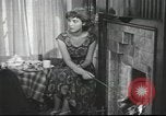 Image of U.S. Airman guest in British home United Kingdom, 1953, second 25 stock footage video 65675065566