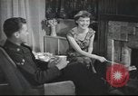 Image of U.S. Airman guest in British home United Kingdom, 1953, second 37 stock footage video 65675065566