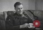 Image of U.S. Airman guest in British home United Kingdom, 1953, second 38 stock footage video 65675065566