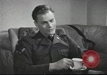 Image of U.S. Airman guest in British home United Kingdom, 1953, second 40 stock footage video 65675065566