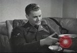 Image of U.S. Airman guest in British home United Kingdom, 1953, second 42 stock footage video 65675065566