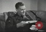 Image of U.S. Airman guest in British home United Kingdom, 1953, second 43 stock footage video 65675065566
