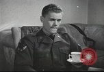 Image of U.S. Airman guest in British home United Kingdom, 1953, second 49 stock footage video 65675065566