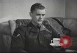 Image of U.S. Airman guest in British home United Kingdom, 1953, second 50 stock footage video 65675065566