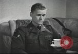 Image of U.S. Airman guest in British home United Kingdom, 1953, second 51 stock footage video 65675065566