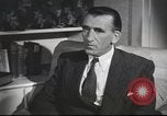 Image of U.S. Airman guest in British home United Kingdom, 1953, second 56 stock footage video 65675065566