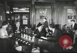 Image of British workers in pub London England United Kingdom, 1953, second 54 stock footage video 65675065567