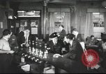 Image of British workers in pub London England United Kingdom, 1953, second 55 stock footage video 65675065567