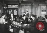 Image of British workers in pub London England United Kingdom, 1953, second 56 stock footage video 65675065567