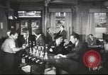 Image of British workers in pub London England United Kingdom, 1953, second 58 stock footage video 65675065567