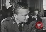 Image of Discussing politics in a Pub United Kingdom, 1953, second 3 stock footage video 65675065568