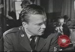 Image of Discussing politics in a Pub United Kingdom, 1953, second 4 stock footage video 65675065568