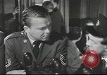 Image of Discussing politics in a Pub United Kingdom, 1953, second 6 stock footage video 65675065568