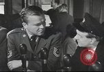 Image of Discussing politics in a Pub United Kingdom, 1953, second 7 stock footage video 65675065568