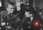 Image of Discussing politics in a Pub United Kingdom, 1953, second 8 stock footage video 65675065568