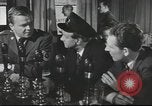 Image of Discussing politics in a Pub United Kingdom, 1953, second 11 stock footage video 65675065568