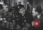 Image of Discussing politics in a Pub United Kingdom, 1953, second 15 stock footage video 65675065568