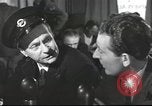 Image of Discussing politics in a Pub United Kingdom, 1953, second 18 stock footage video 65675065568