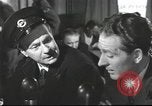 Image of Discussing politics in a Pub United Kingdom, 1953, second 19 stock footage video 65675065568