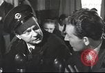 Image of Discussing politics in a Pub United Kingdom, 1953, second 21 stock footage video 65675065568