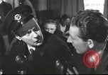 Image of Discussing politics in a Pub United Kingdom, 1953, second 23 stock footage video 65675065568