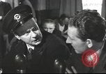 Image of Discussing politics in a Pub United Kingdom, 1953, second 24 stock footage video 65675065568
