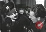 Image of Discussing politics in a Pub United Kingdom, 1953, second 25 stock footage video 65675065568