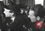 Image of Discussing politics in a Pub United Kingdom, 1953, second 27 stock footage video 65675065568