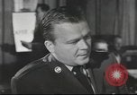 Image of Discussing politics in a Pub United Kingdom, 1953, second 31 stock footage video 65675065568