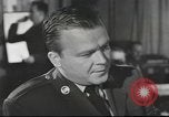 Image of Discussing politics in a Pub United Kingdom, 1953, second 32 stock footage video 65675065568