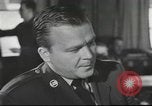Image of Discussing politics in a Pub United Kingdom, 1953, second 34 stock footage video 65675065568