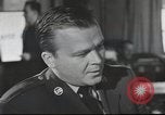 Image of Discussing politics in a Pub United Kingdom, 1953, second 35 stock footage video 65675065568