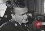Image of Discussing politics in a Pub United Kingdom, 1953, second 36 stock footage video 65675065568