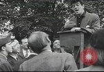 Image of Discussing politics in a Pub United Kingdom, 1953, second 41 stock footage video 65675065568