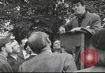 Image of Discussing politics in a Pub United Kingdom, 1953, second 42 stock footage video 65675065568